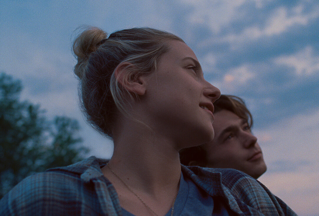 Lili Reinhart as Grace Town and Austin Abrams as Henry Page